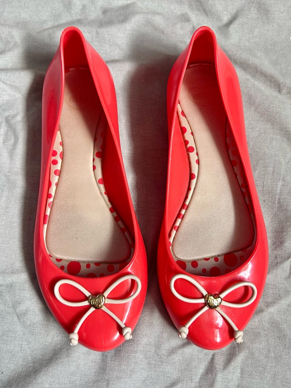 Mel by Melissa neon coral jelly flats